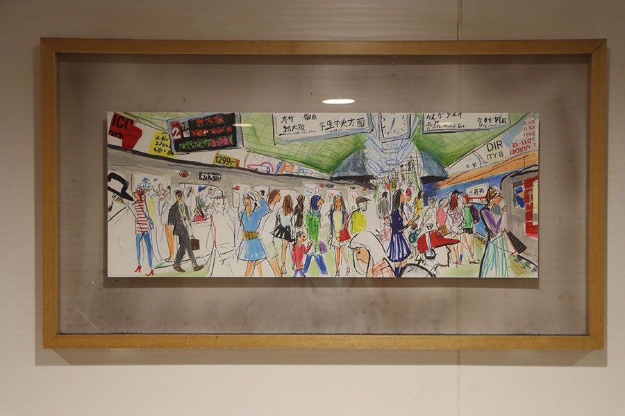 一部のトイレ内に飾られた絵画。大阪メトロの駅や列車などさまざまな風景が描かれている